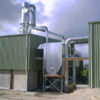 Cyclone with return line into dust collector